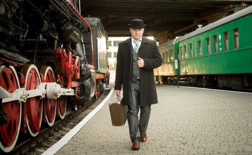 Well dressed man on train platform