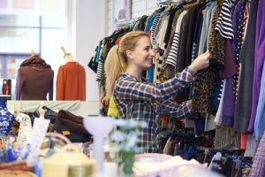 woman shopping at thrift store