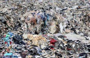 massive landfill of used clothing