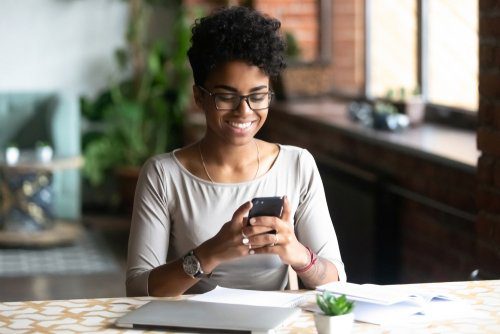 woman shopping online with phone