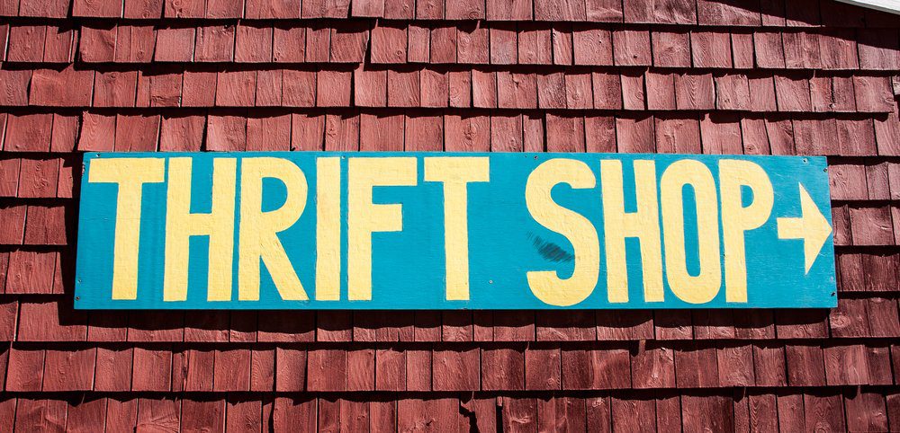 thrift shop sign on side of building