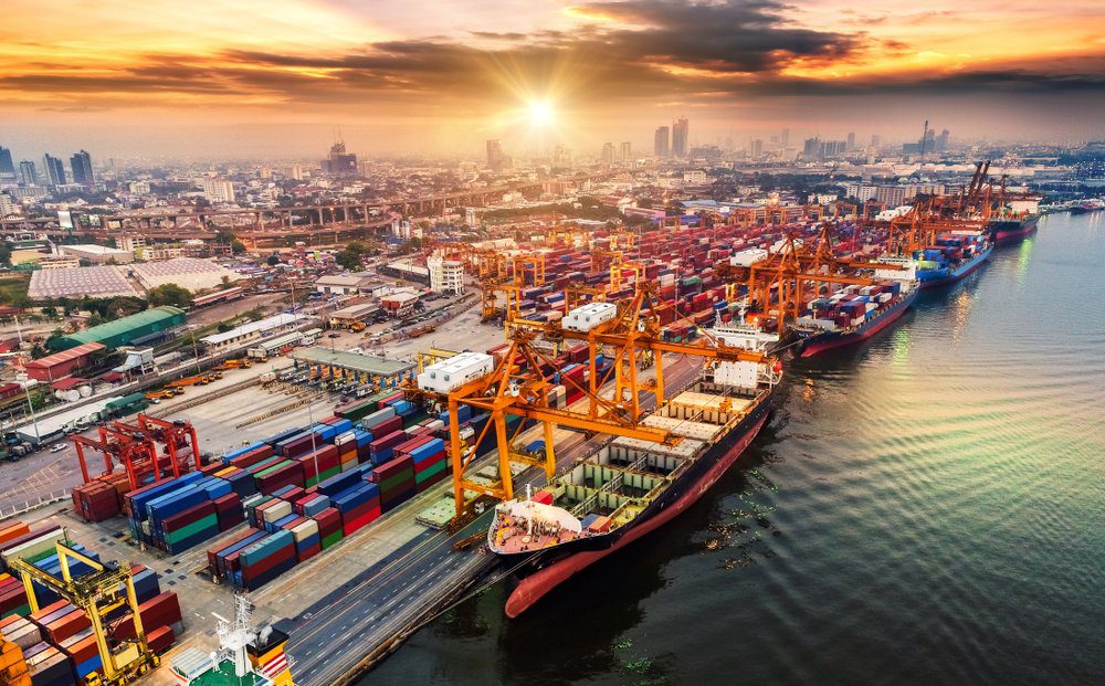 cargo container ships at a busy port