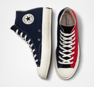 a red and blue converse sneaker