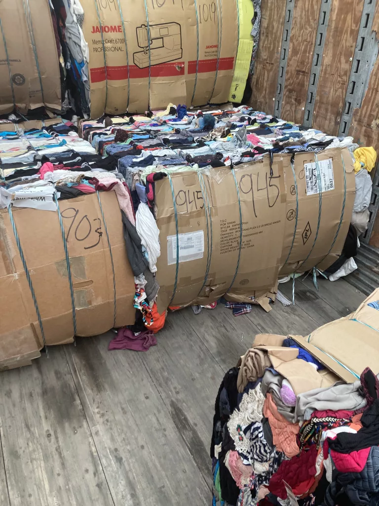 Bales of used clothing packed tightly