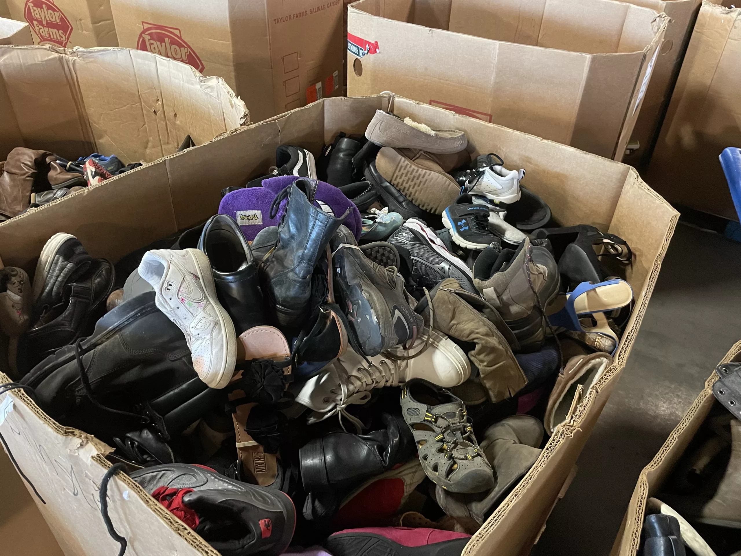 singular used shoes in a box